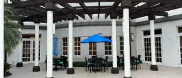 Residential pergola over outdoor dining area
